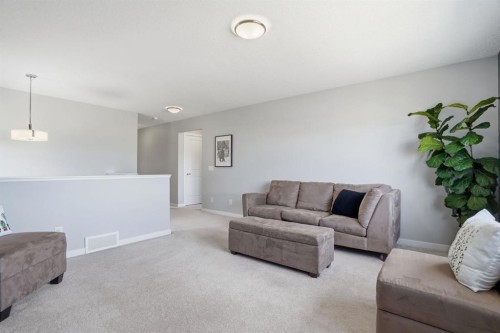 81 Mount Rae Heights, Okotoks, AB - Indoor Photo Showing Living Room