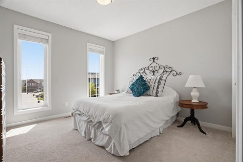 81 Mount Rae Heights, Okotoks, AB - Indoor Photo Showing Bedroom