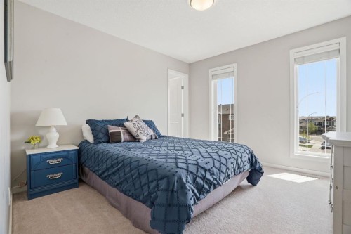 81 Mount Rae Heights, Okotoks, AB - Indoor Photo Showing Bedroom