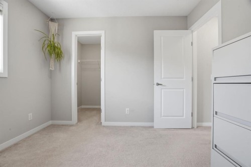 81 Mount Rae Heights, Okotoks, AB - Indoor Photo Showing Other Room
