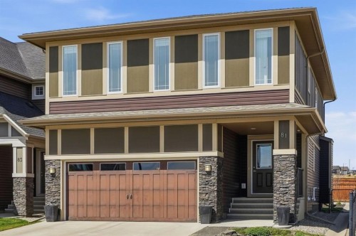 81 Mount Rae Heights, Okotoks, AB - Outdoor With Facade