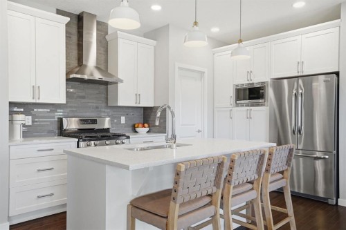 81 Mount Rae Heights, Okotoks, AB - Indoor Photo Showing Kitchen With Stainless Steel Kitchen With Upgraded Kitchen