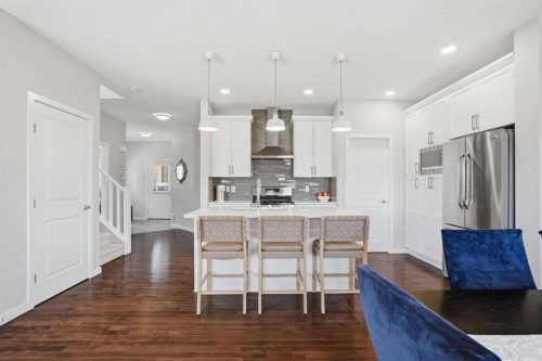 81 Mount Rae Heights, Okotoks, AB - Indoor Photo Showing Kitchen With Upgraded Kitchen
