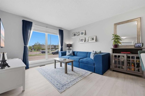 160 Silvergrove Hill Nw, Calgary, AB - Indoor Photo Showing Living Room