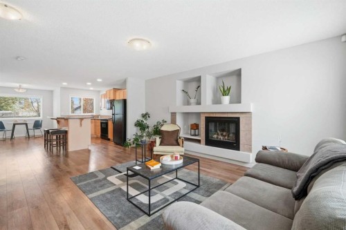 29 Copperfield Heath Se, Calgary, AB - Indoor Photo Showing Living Room With Fireplace
