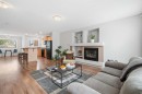 29 Copperfield Heath Se, Calgary, AB  - Indoor Photo Showing Living Room With Fireplace 