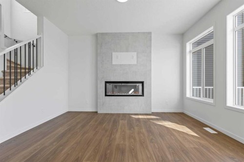131 Corner Glen Grove Ne, Calgary, AB - Indoor Photo Showing Living Room With Fireplace