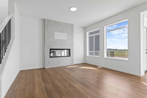 131 Corner Glen Grove Ne, Calgary, AB - Indoor Photo Showing Living Room With Fireplace