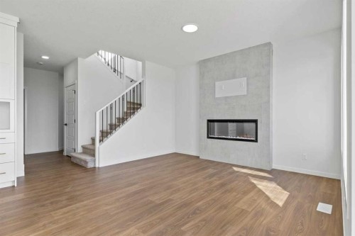 131 Corner Glen Grove Ne, Calgary, AB - Indoor With Fireplace