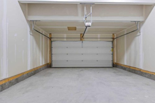 131 Corner Glen Grove Ne, Calgary, AB - Indoor Photo Showing Garage