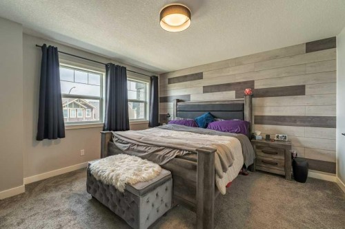 110 Hillcrest Close Sw, Airdrie, AB - Indoor Photo Showing Bedroom