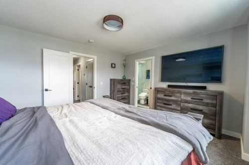 110 Hillcrest Close Sw, Airdrie, AB - Indoor Photo Showing Bedroom