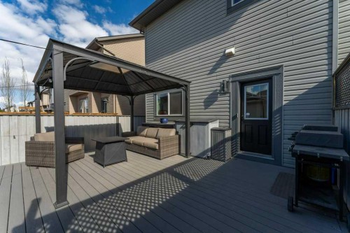 110 Hillcrest Close Sw, Airdrie, AB - Outdoor With Deck Patio Veranda With Exterior