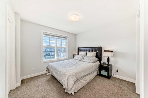 551 Evanston Link Nw, Calgary, AB - Indoor Photo Showing Bedroom