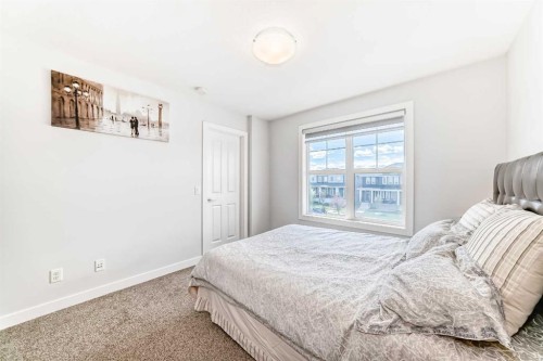 551 Evanston Link Nw, Calgary, AB - Indoor Photo Showing Bedroom