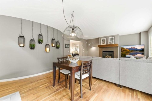 39 Evercreek Bluffs Road Sw, Calgary, AB - Indoor With Fireplace