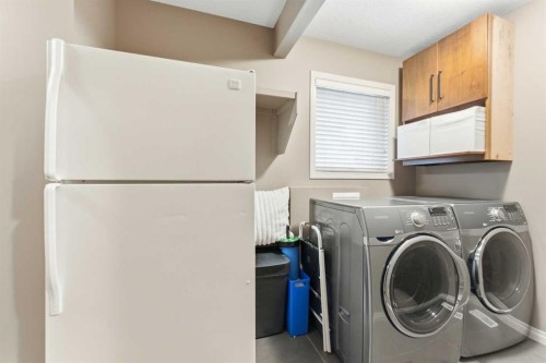 39 Evercreek Bluffs Road Sw, Calgary, AB - Indoor Photo Showing Laundry Room