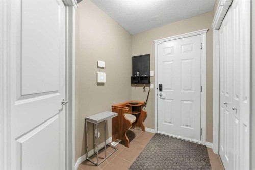 39 Evercreek Bluffs Road Sw, Calgary, AB - Indoor Photo Showing Other Room
