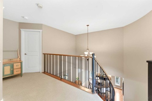 39 Evercreek Bluffs Road Sw, Calgary, AB - Indoor Photo Showing Other Room