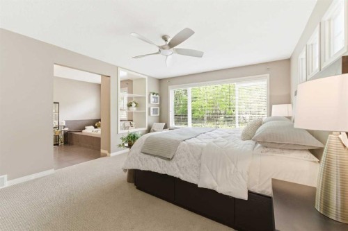 39 Evercreek Bluffs Road Sw, Calgary, AB - Indoor Photo Showing Bedroom