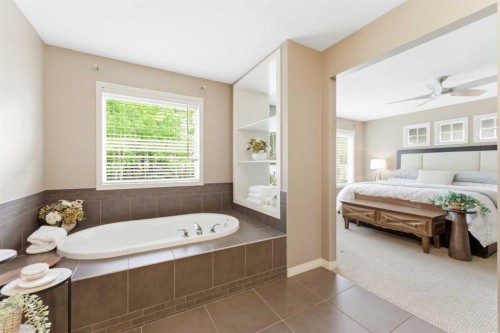 39 Evercreek Bluffs Road Sw, Calgary, AB - Indoor Photo Showing Bedroom
