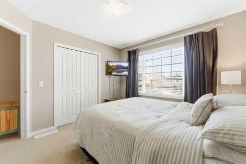 39 Evercreek Bluffs Road Sw, Calgary, AB - Indoor Photo Showing Bedroom