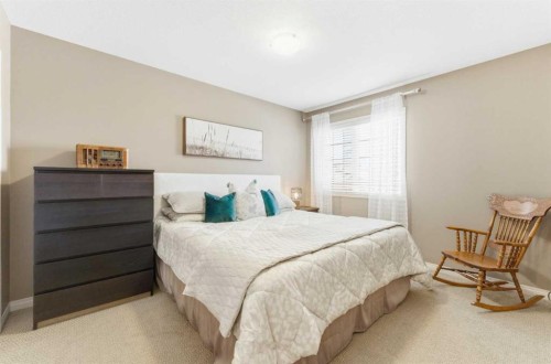39 Evercreek Bluffs Road Sw, Calgary, AB - Indoor Photo Showing Bedroom