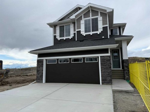 147 sundown Crescent  Cochrane, AB T4C 1Y3