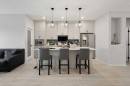22 Edith Manor Nw, Calgary, AB  - Indoor Photo Showing Kitchen With Upgraded Kitchen 