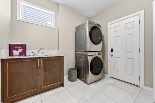71 Walden Manor Se, Calgary, AB - Indoor Photo Showing Laundry Room