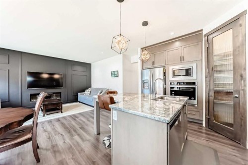65 Saddlestone Green Ne, Calgary, AB - Indoor Photo Showing Kitchen With Upgraded Kitchen