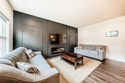 65 Saddlestone Green Ne, Calgary, AB - Indoor Photo Showing Living Room