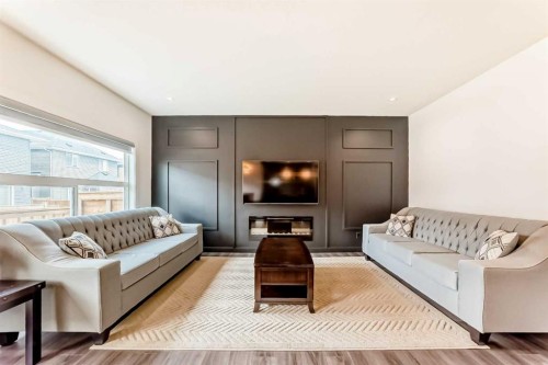 65 Saddlestone Green Ne, Calgary, AB - Indoor Photo Showing Living Room