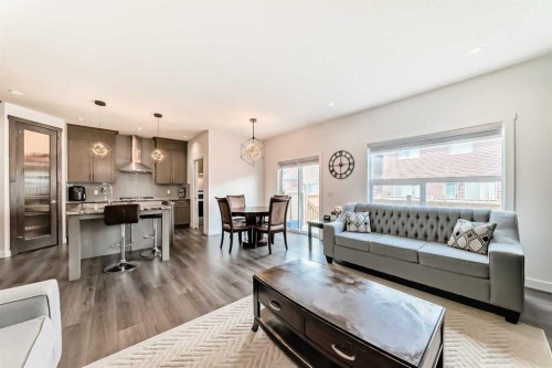 65 Saddlestone Green Ne, Calgary, AB - Indoor Photo Showing Living Room