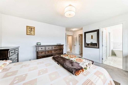 65 Saddlestone Green Ne, Calgary, AB - Indoor Photo Showing Bedroom