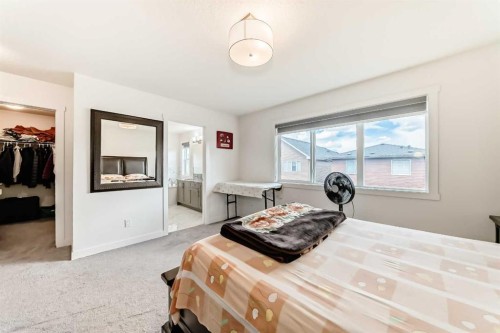 65 Saddlestone Green Ne, Calgary, AB - Indoor Photo Showing Bedroom