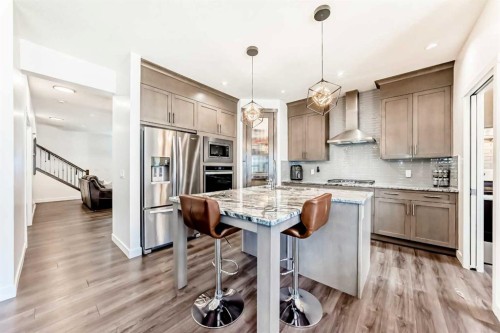 65 Saddlestone Green Ne, Calgary, AB - Indoor Photo Showing Kitchen With Upgraded Kitchen