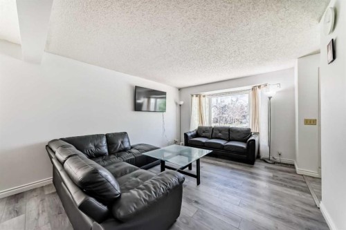 279 Falton Drive Ne, Calgary, AB - Indoor Photo Showing Living Room