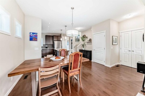 199 River Heights Green, Cochrane, AB - Indoor Photo Showing Dining Room