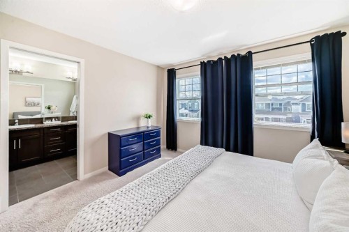 199 River Heights Green, Cochrane, AB - Indoor Photo Showing Bedroom
