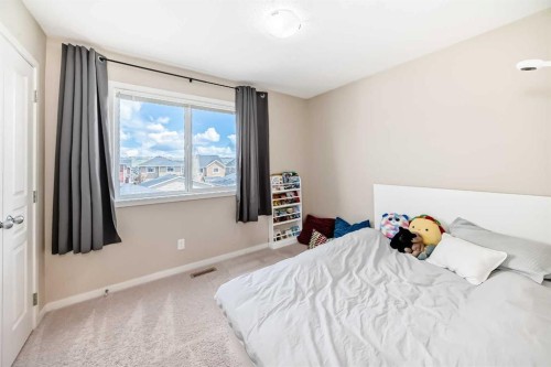 199 River Heights Green, Cochrane, AB - Indoor Photo Showing Bedroom