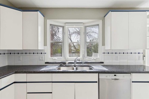 1207 Baldwin Crescent Sw, Calgary, AB - Indoor Photo Showing Kitchen With Double Sink