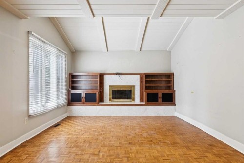 1207 Baldwin Crescent Sw, Calgary, AB - Indoor With Fireplace