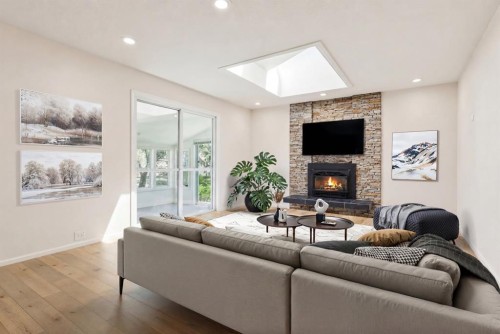 40 Varston Place Nw, Calgary, AB - Indoor Photo Showing Living Room With Fireplace