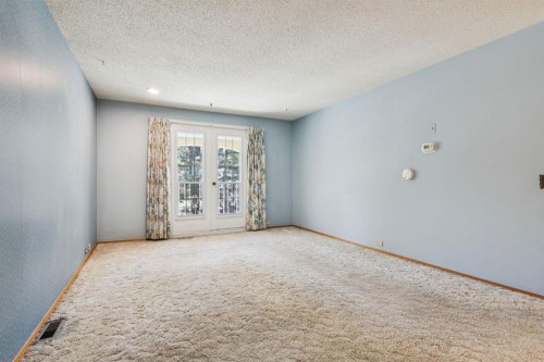40 Varston Place Nw, Calgary, AB - Indoor Photo Showing Other Room