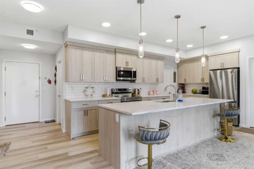 3417-33 Carringham Gate Nw, Calgary, AB - Indoor Photo Showing Kitchen With Stainless Steel Kitchen With Upgraded Kitchen