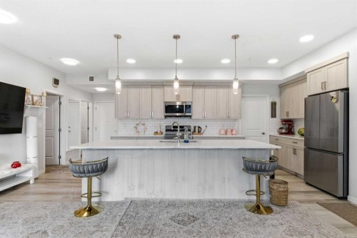 3417-33 Carringham Gate Nw, Calgary, AB - Indoor Photo Showing Kitchen With Stainless Steel Kitchen With Upgraded Kitchen
