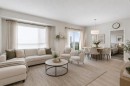 3417-33 Carringham Gate Nw, Calgary, AB  - Indoor Photo Showing Living Room 