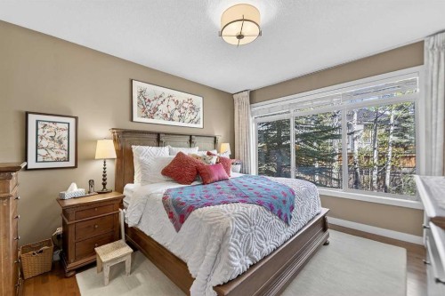 43 Cortina Villas Sw, Calgary, AB - Indoor Photo Showing Bedroom