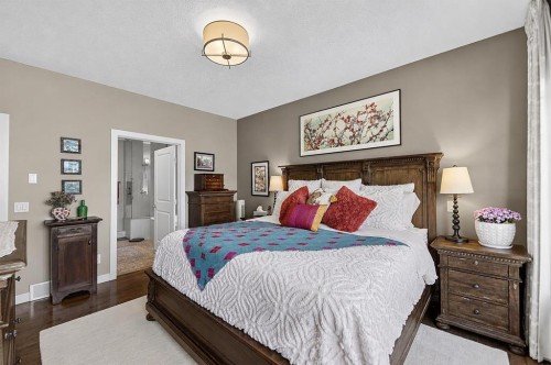 43 Cortina Villas Sw, Calgary, AB - Indoor Photo Showing Bedroom